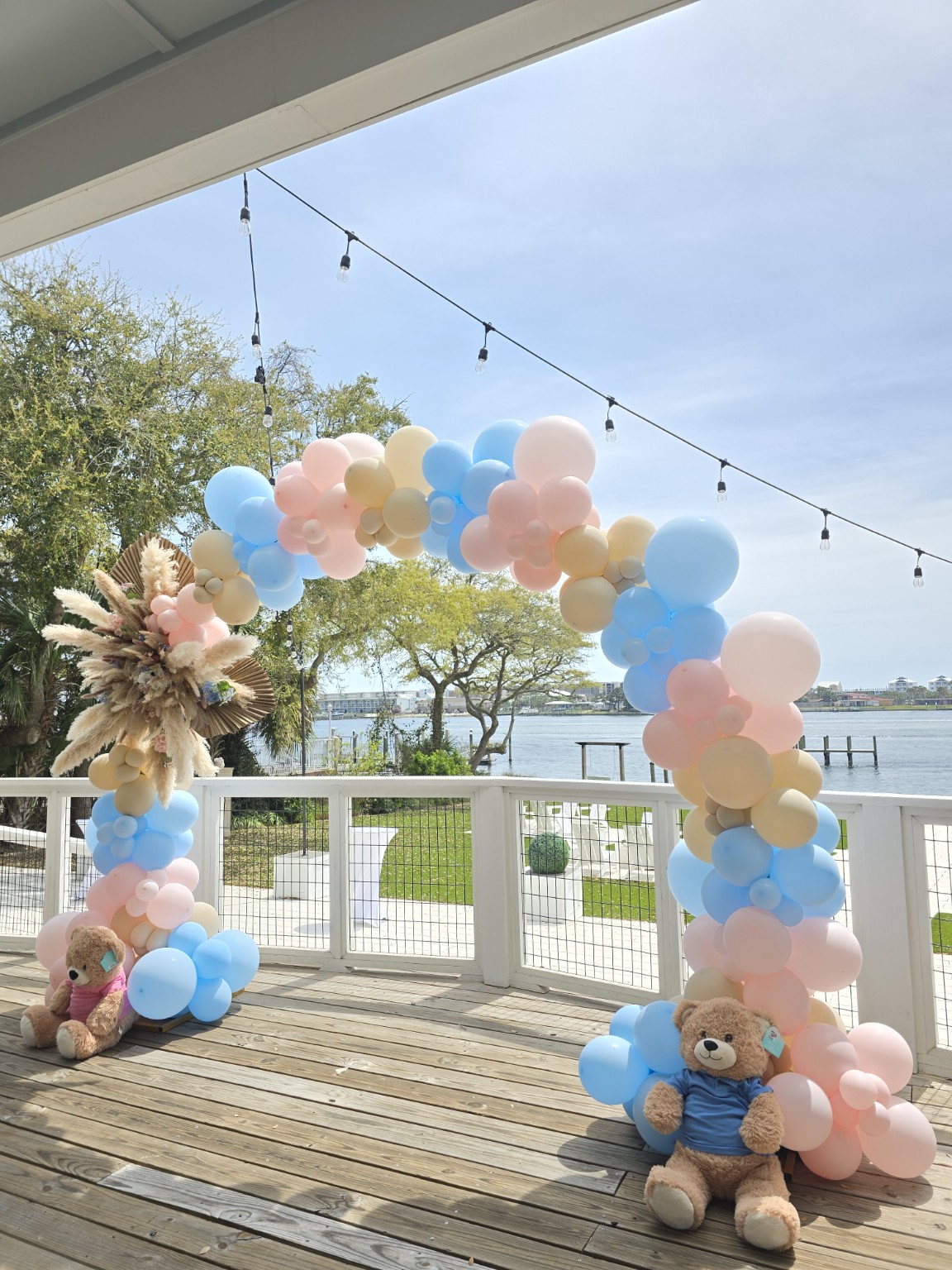 Pastel balloon arch waterfront baby shower décor